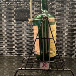 vintage J&B scotch large display bottle in iron swing cradle rare