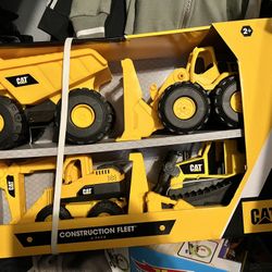Set Of 4 cat Trucks 