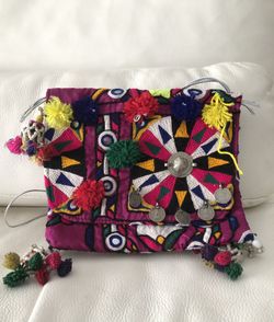 Colorful And Artsy Purse With Long Silver Strings