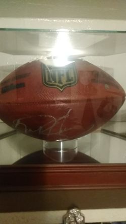 Signed NFL football from Derrick Henry Tennessee Titans in glass case