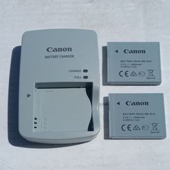 CANON BATTERY CHARGER. TWO BATTERIES. BRAND NEW. 