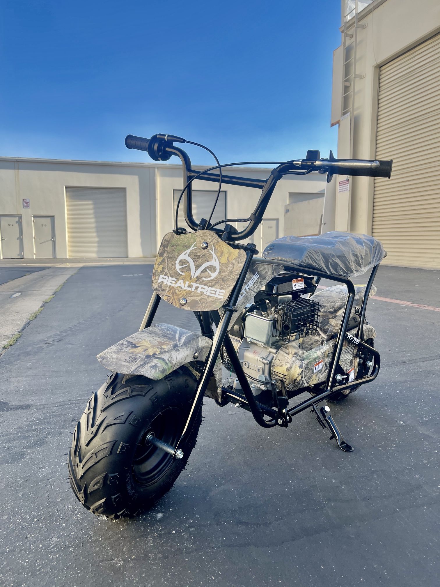 Realtree Gas Powered 105cc Camo Power Ride-On Mini Bike top speed about 28mph, mix weight 180lb