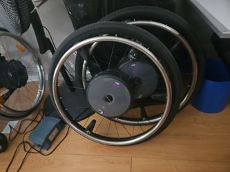 Alber M25 power assist wheels.