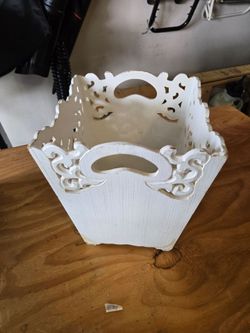 White decorative trash bin