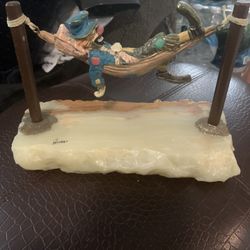 Clown and a hammock by Ron