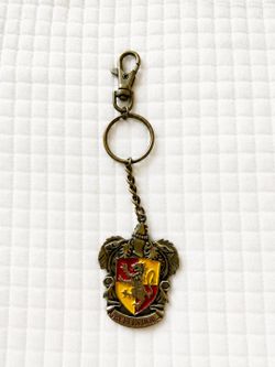 Officially Licensed Harry Potter Gryffindor Crest Metal Keychain | WBEI | Antique Bronze Finish | Bag Charm | Wizarding World Collectible
