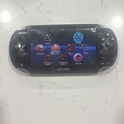PSVITA with games and case