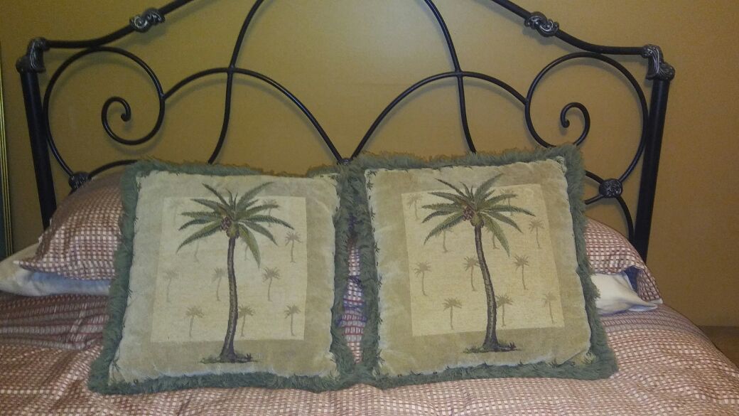 Tommy Bahama Style Throw Pillows with palm tree accents.