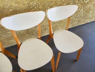 Four wooden chairs