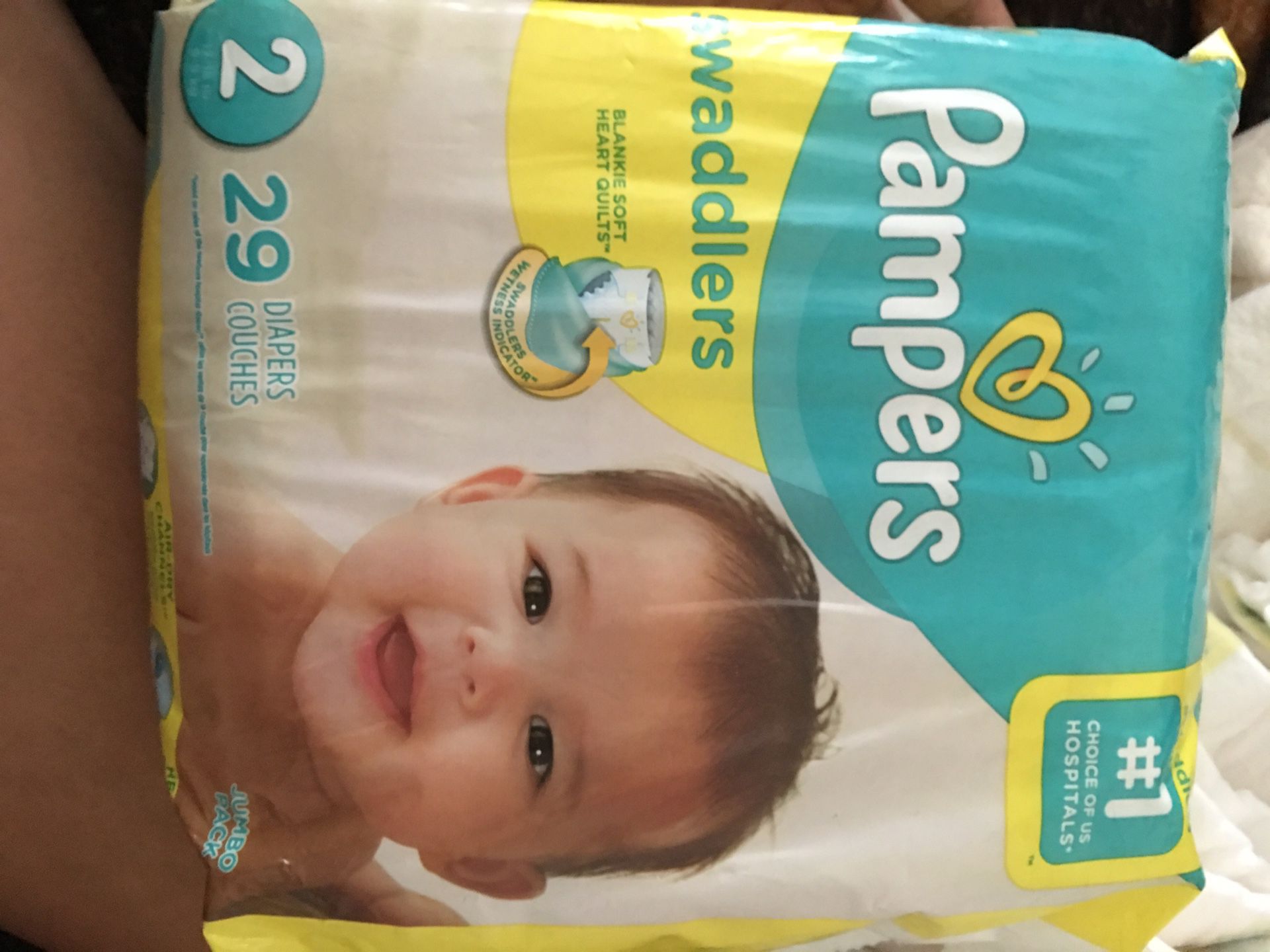 Size 2 Diapers in open box! 88 diapers in total.