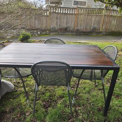 Beautiful wood and metal patio dining set