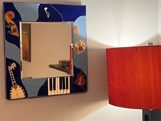 Mirror. Hand made ceramic pieces frame