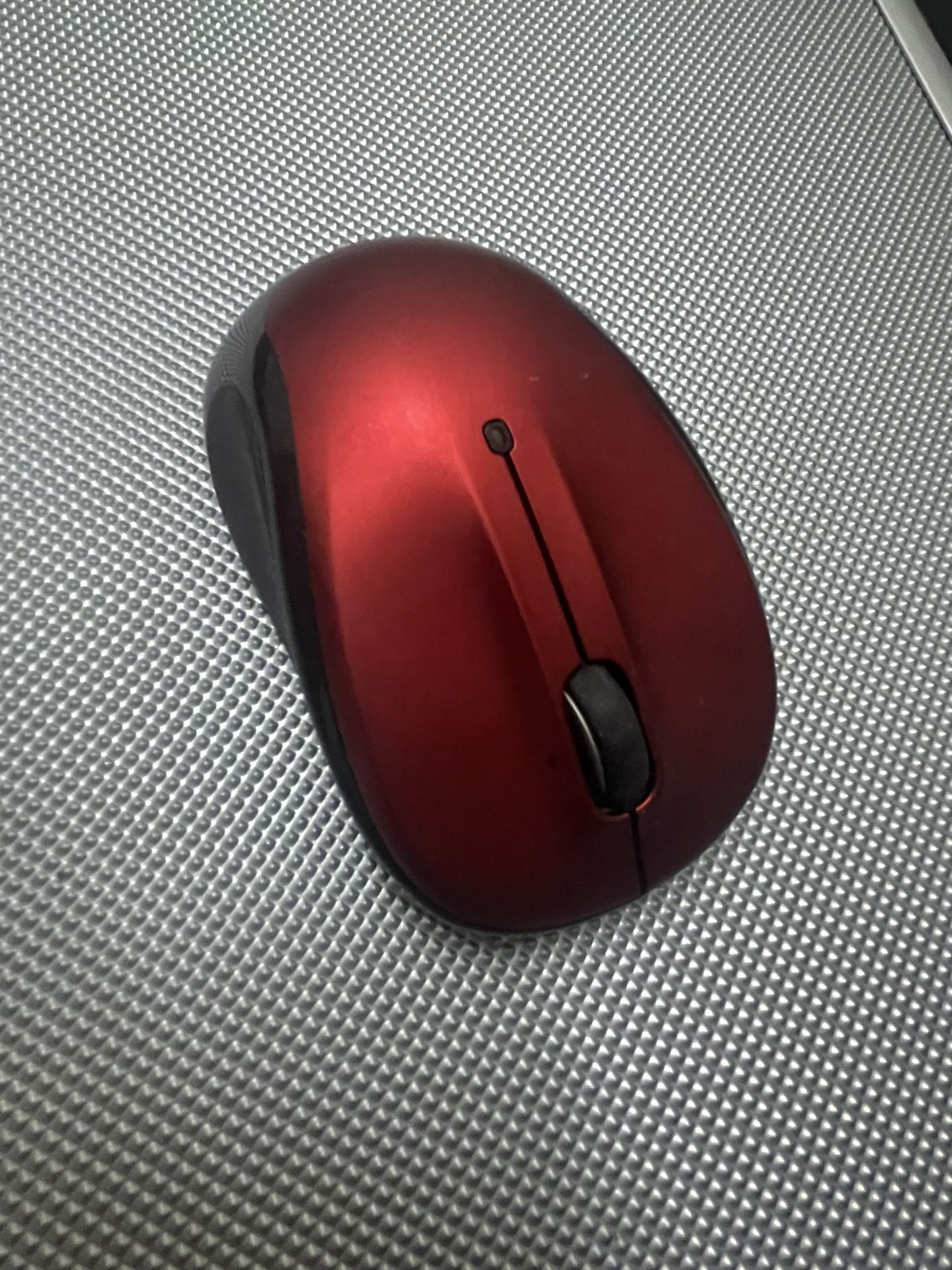 Red Logitech wireless Mouse