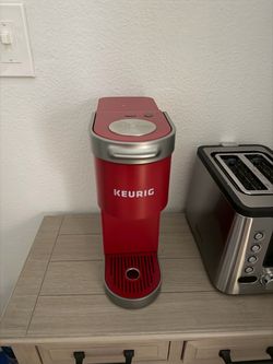 Red single serve coffee maker