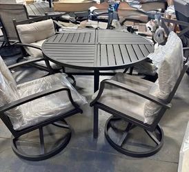 Newly Assembled Outdoor Aluminum Dining Table w/ 4 Swivel Chairs Outdoor Chairs and table