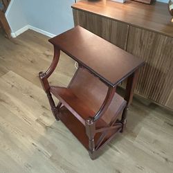 Wooden end table with diagonal shelf