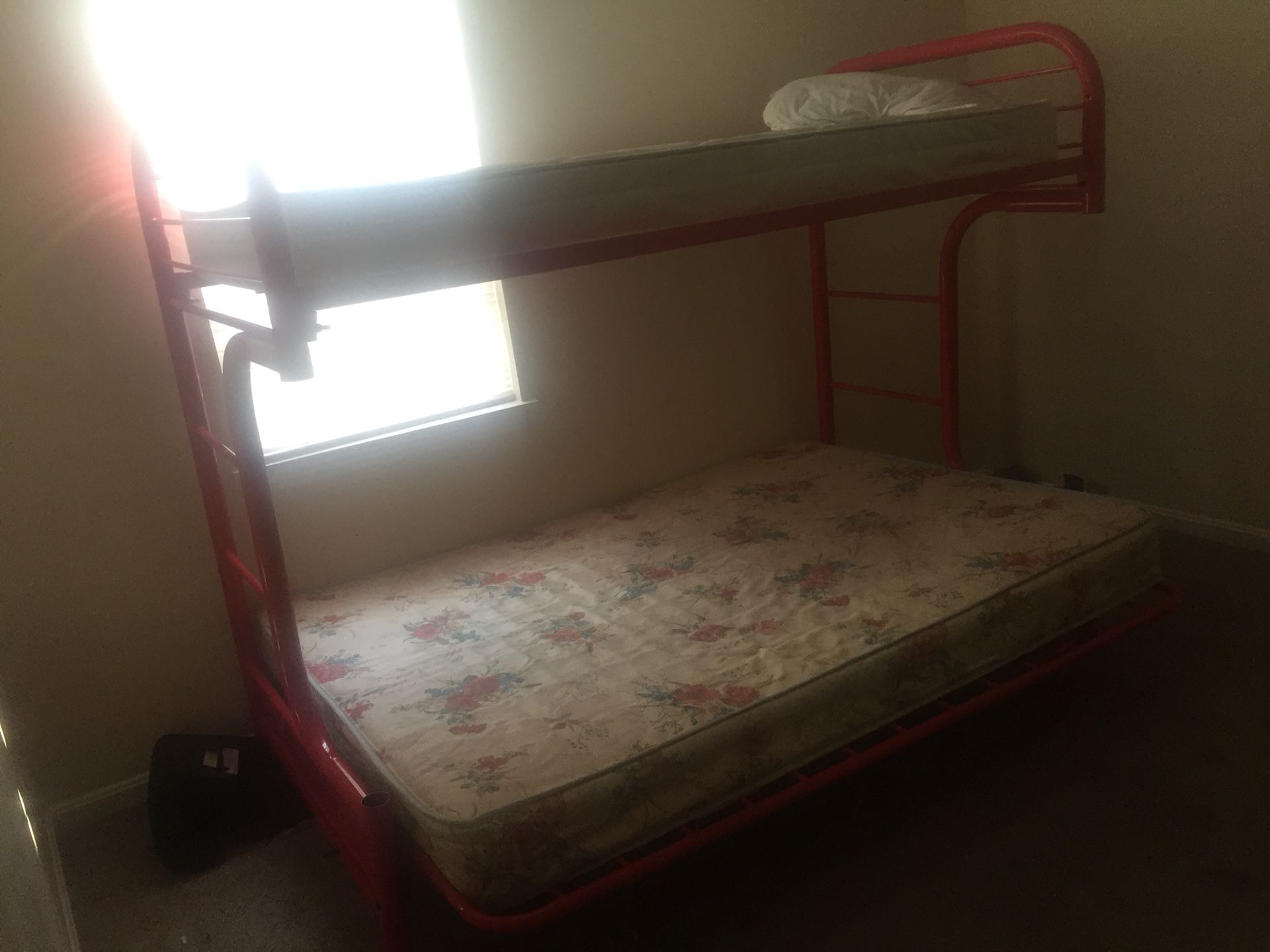 All red kids bunk bed .