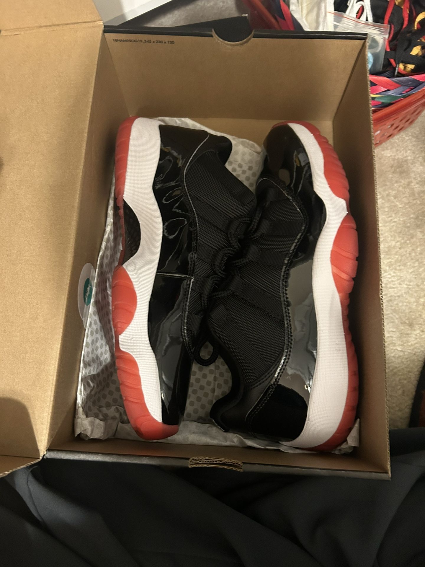 Jordan 11 Low Bred