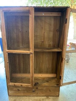 Rustic Wood Cabinet with Wire Mesh Doors