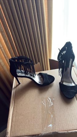 Black suede heels with tassels