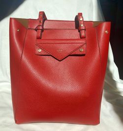 Brand New Super fabulous Red Red Tutilo New York Tote 13”x11”x6”- Fits Tablets and Laptop. Great for school or work. Zipper closure Zipper interior p