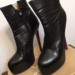 Christian Louboutin Black Leather Heels Ankle Boots. Size 37. 100 % Perfect and excellent condition 