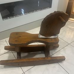 Vintage hand carved ridding horse
