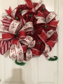 Christmas feeling red ribbon and elf feet Christmas wreath