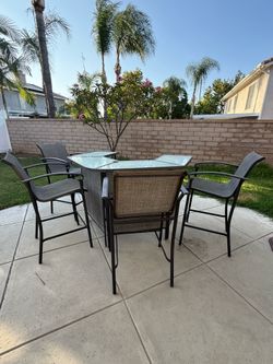 Bar table with chairs