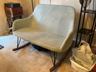 ROCKING LOVE SEAT.