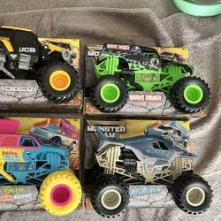 Digatron, Megalodon, Grave Digger, and Bailey Circuit Series 25, 1:24