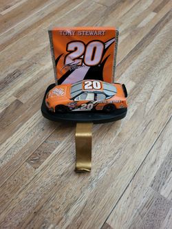 VINTAGE 2004 JOE GIBBS RACING TONY STEWART THE HOME DEPOT DIE CAST RACING CAR W/XMAS STOCKING HOLDER