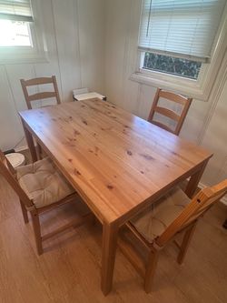 IKEA DINING TABLE AND FOUR CHAIRS
