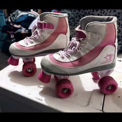 Roller derby, brand rollerskates, size 4 pink and white