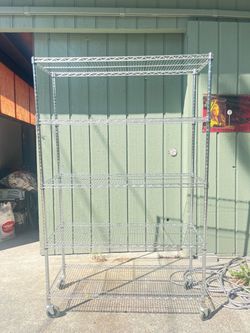 Metal storage shelf, adjustable