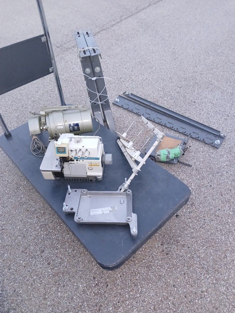 FOR PARTS (but all are included) Industrial Serger Machine and table set up with motor.  