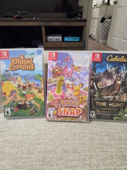 Black nintendo switch and games