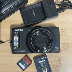 Nikon Coolpix S9300 black digital camera 16 MP Tested Works  Flash zoom video photo all working. Includes case, charger, memory card and battery.