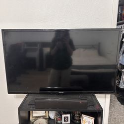 40in SAMSUNG tv And Stand 