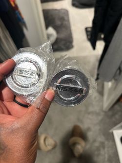 (2) Nissan Altima center caps for wheels