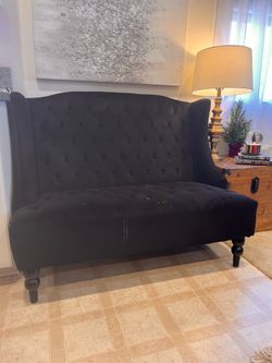 Black velvet beautiful sofa.