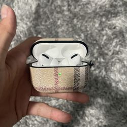 Used airpods pro first gen with burberry case