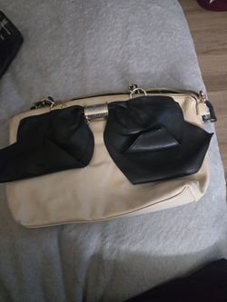 Cream Leather Clutch Bag with Black Bow