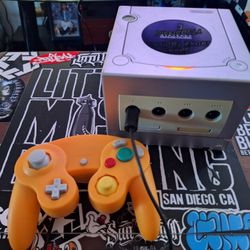 Game Cube With One Controller And Power Cables And Mortal Kombat Deadly Alliance And Shreck 2 