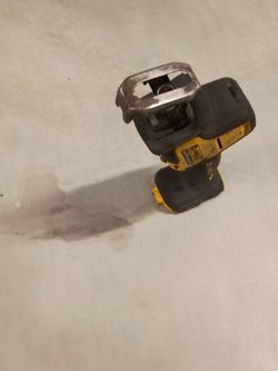 This is a DEWALT ATOMIC 20V MAX Cordless One-Handed Reciprocating Saw.