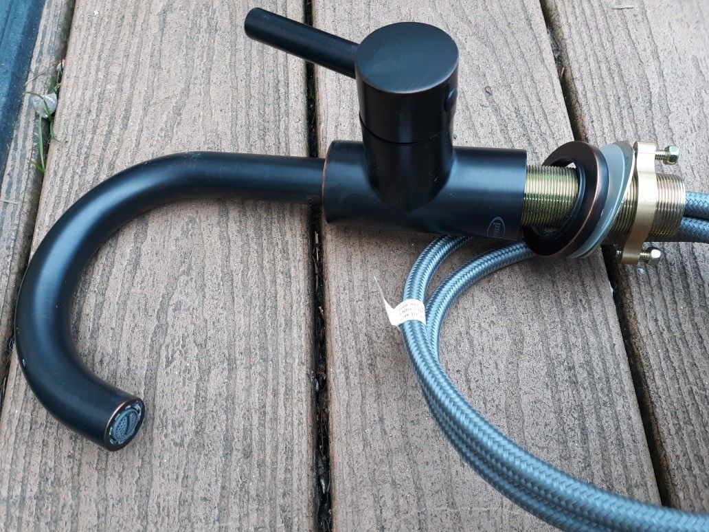 9 In Bronze Single Hole Faucet With Hoses And Mounting Hardware