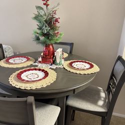 Dinning table of 4, only had had for a couple of months, technically like new