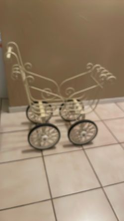 Vintage doll pram baby shower decor