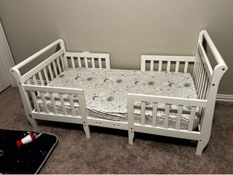 Toddler bed frame and mattress