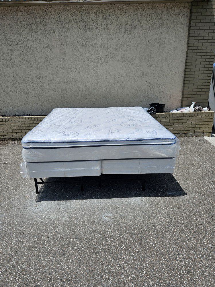Brand new king-size pillow top mattress and box spring in Plastics 